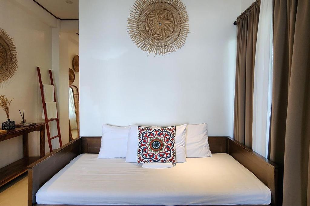 Postel nebo postele na pokoji v ubytování Sirom Beach House