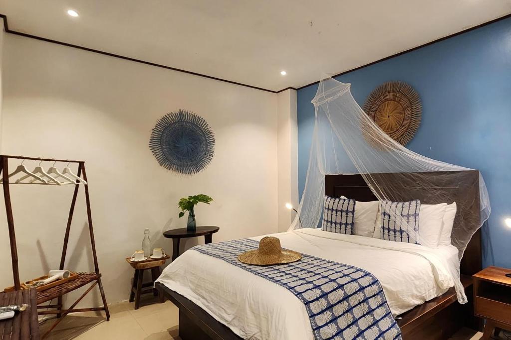 Postel nebo postele na pokoji v ubytování Sirom Beach House