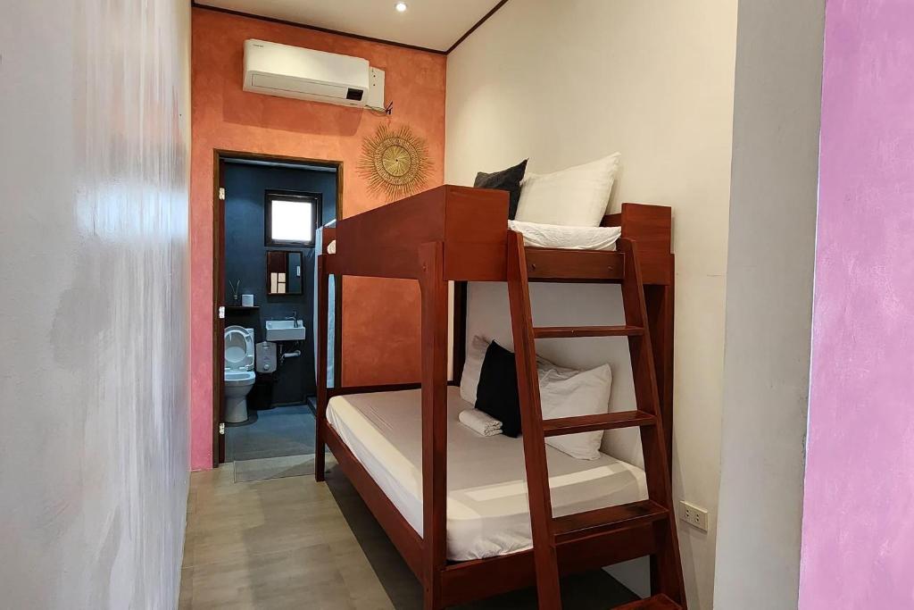 Postel nebo postele na pokoji v ubytování Sirom Beach House