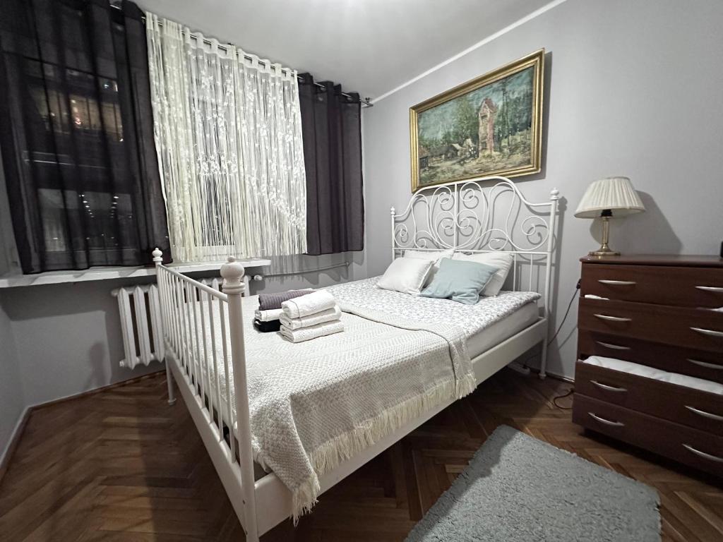 Posteľ alebo postele v izbe v ubytovaní CityApartHome6 CENTRUM PARKING