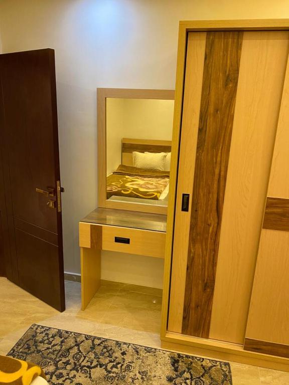 Postel nebo postele na pokoji v ubytování Piramid,s Elhmam city apartments sea view