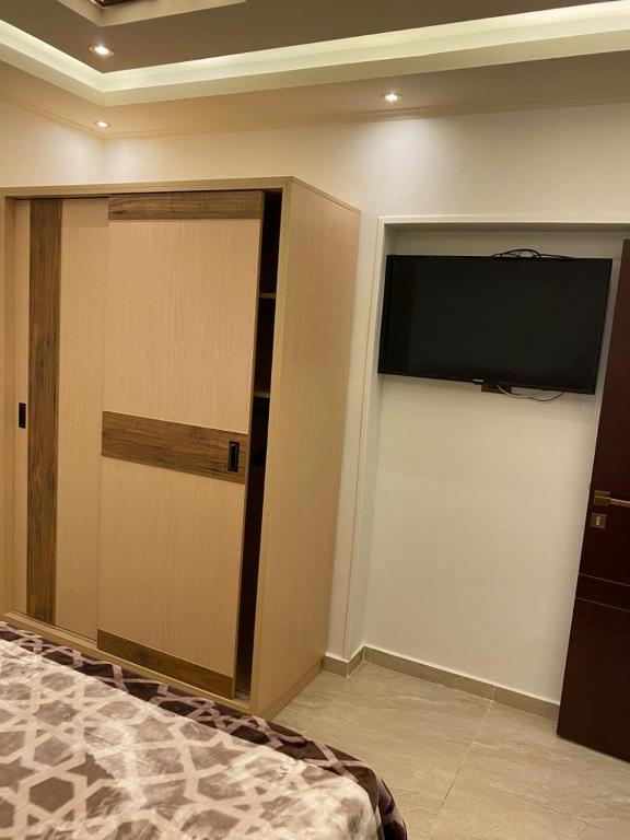 Postel nebo postele na pokoji v ubytování Piramid,s Elhmam city apartments sea view
