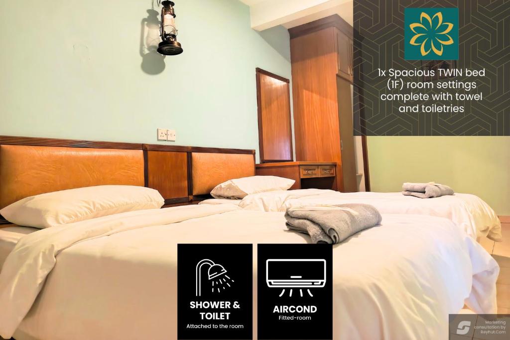 Postel nebo postele na pokoji v ubytování Thara Hotel & Resort