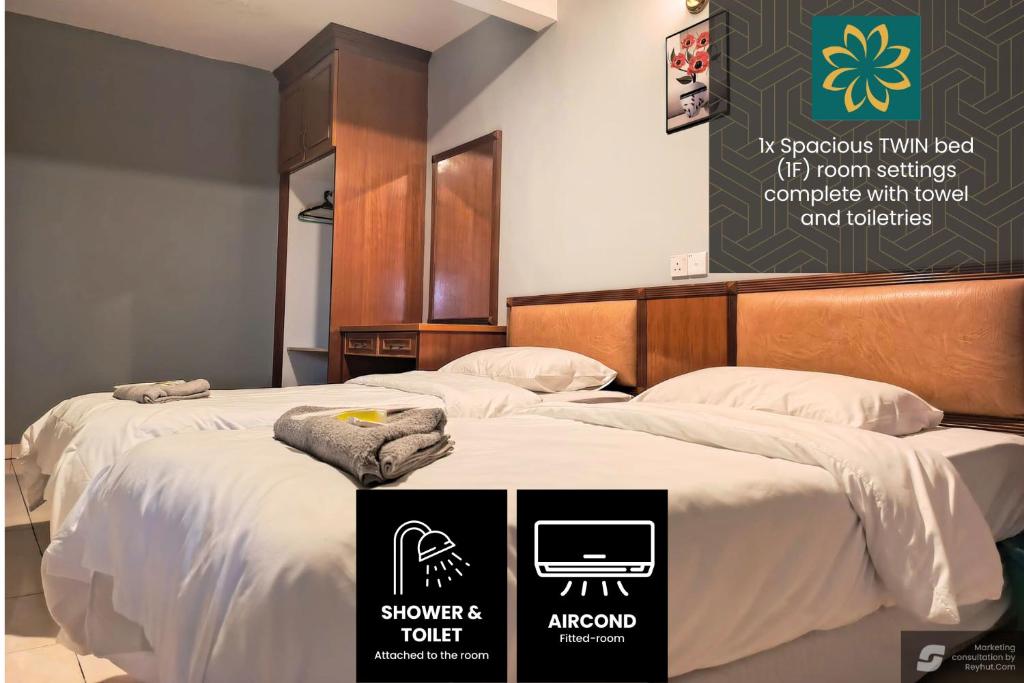 Postel nebo postele na pokoji v ubytování Thara Hotel & Resort