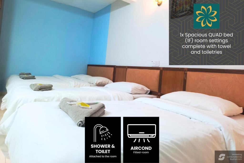 Postel nebo postele na pokoji v ubytování Thara Hotel & Resort