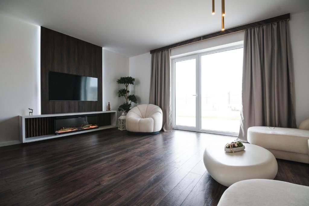 TV a/nebo společenská místnost v ubytování OLI Apartmán