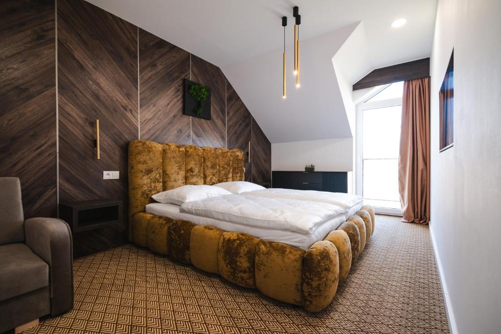 Postel nebo postele na pokoji v ubytování OLI Apartmán