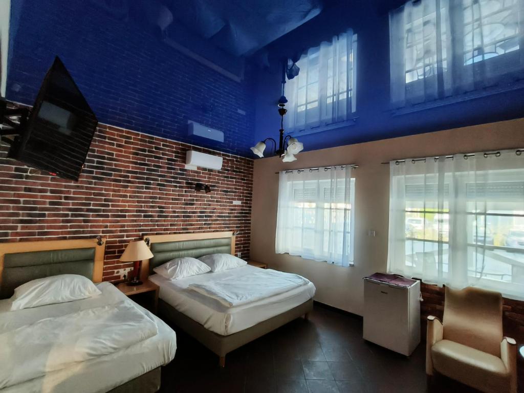 Posteľ alebo postele v izbe v ubytovaní Villa Bella Casa
