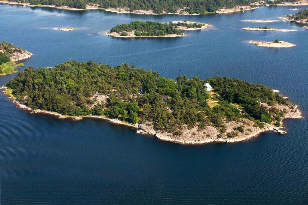 an island in the middle of a body of water at Idöborgs Stuguthyrning in Nämdö