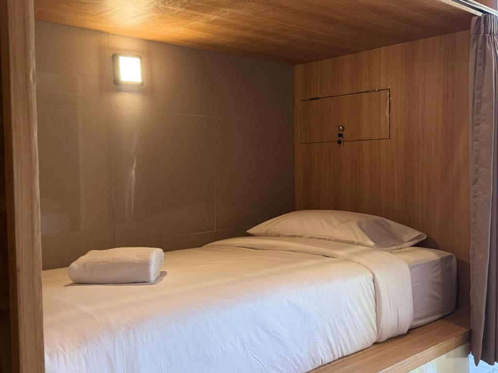 Postel nebo postele na pokoji v ubytování Ungasan Center Hostel