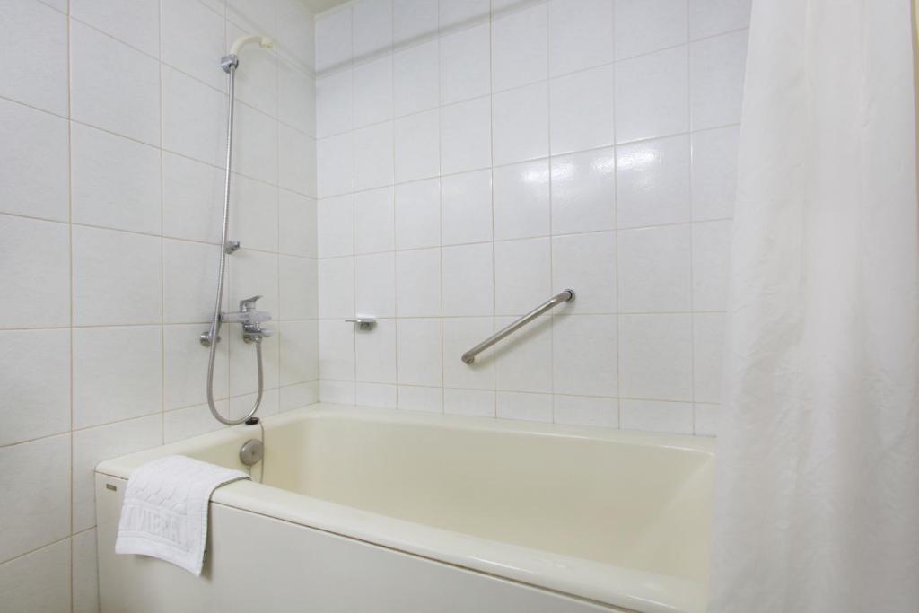 Koupelna v ubytování Libero Hotel