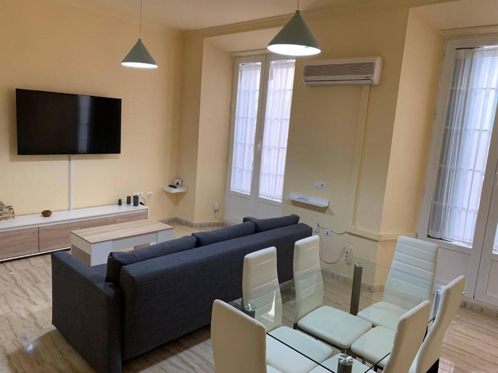 Televízia a/alebo spoločenská miestnosť v ubytovaní Apartamento Marín García C Centro Histórico