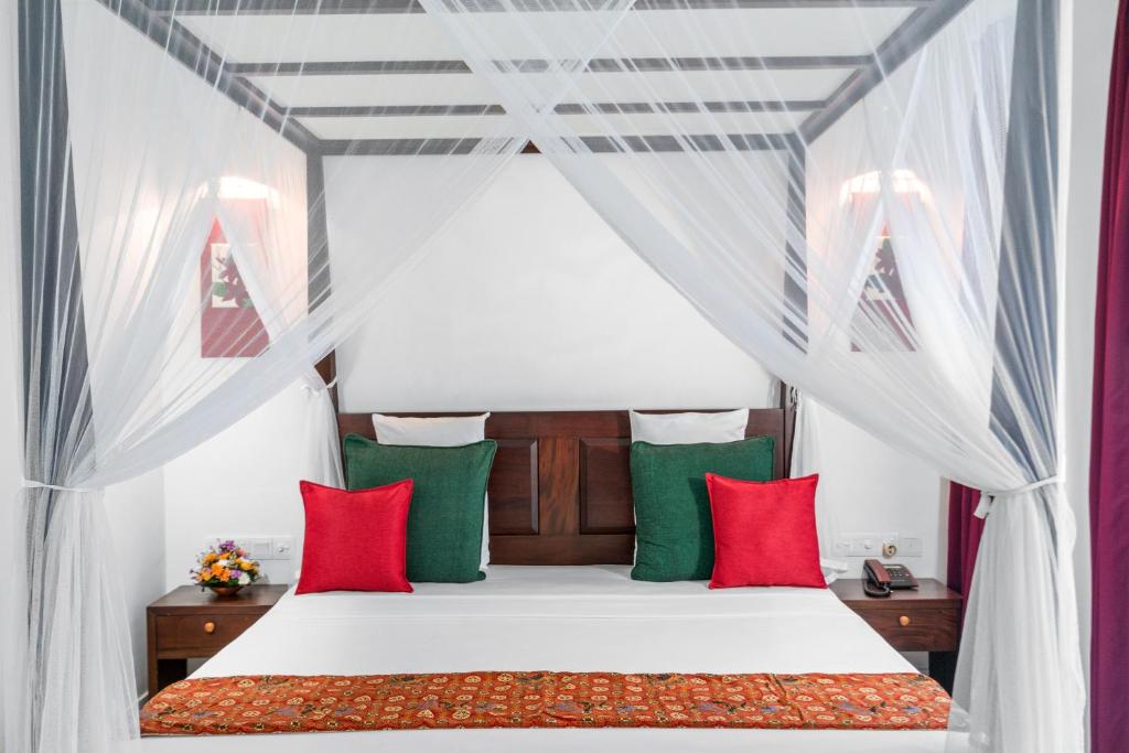Postel nebo postele na pokoji v ubytování AIDA Hotel - Bentota