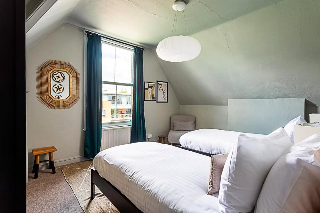 Postel nebo postele na pokoji v ubytování Stylish Boutique Apartment