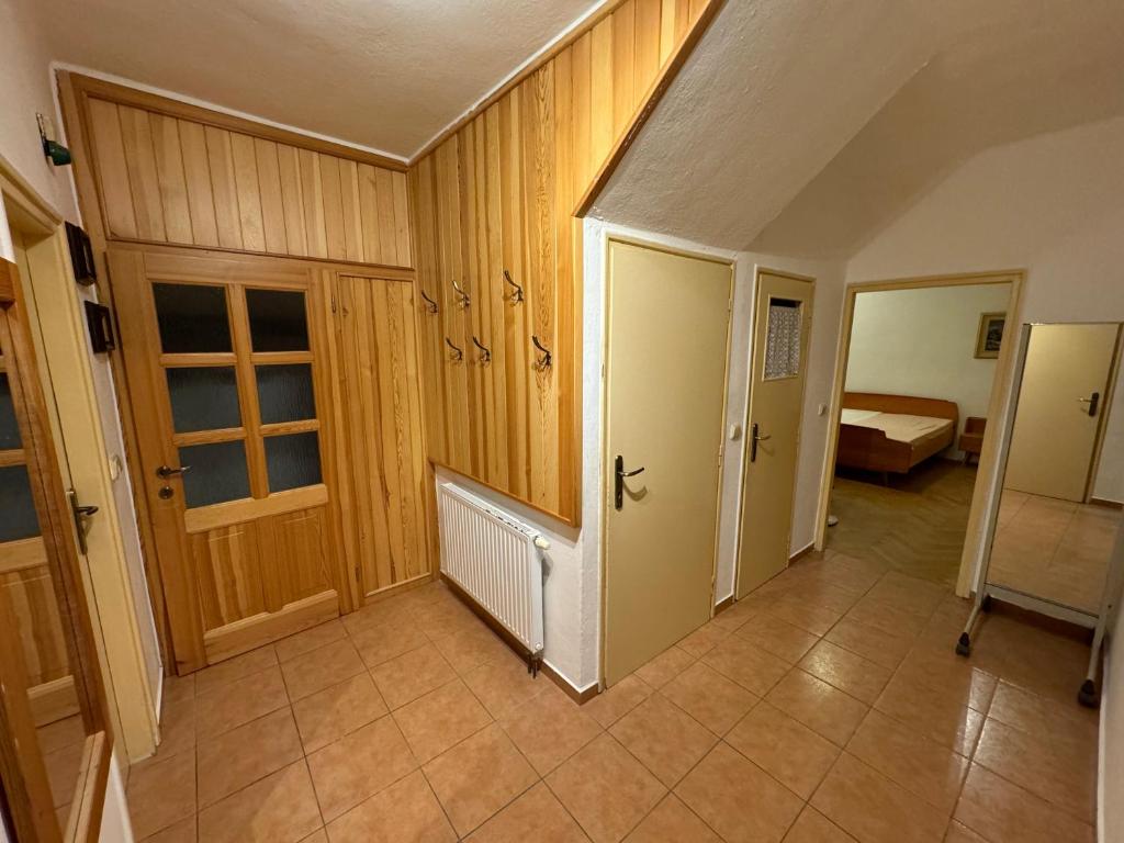 Postel nebo postele na pokoji v ubytování Apartmán U Vachtů