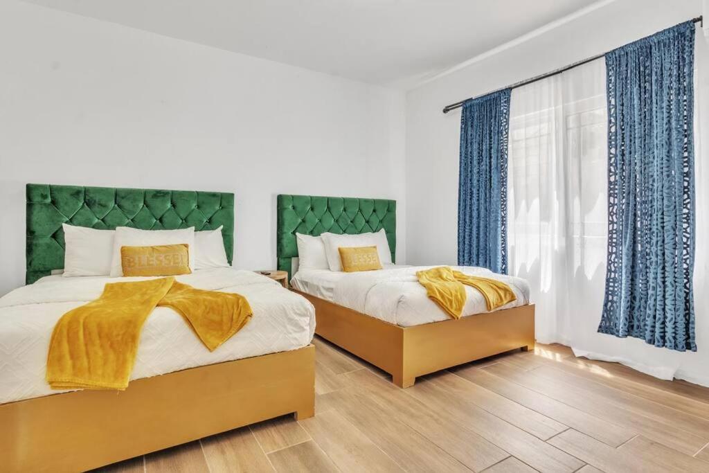Postel nebo postele na pokoji v ubytování Mosaic luxury Villa
