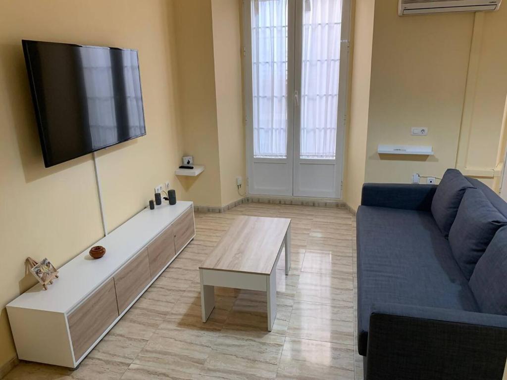 Televízia a/alebo spoločenská miestnosť v ubytovaní Apartamento Marín García C Centro Histórico