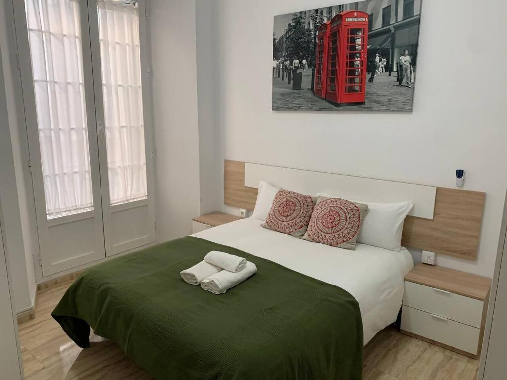 Posteľ alebo postele v izbe v ubytovaní Apartamento Marín García C Centro Histórico
