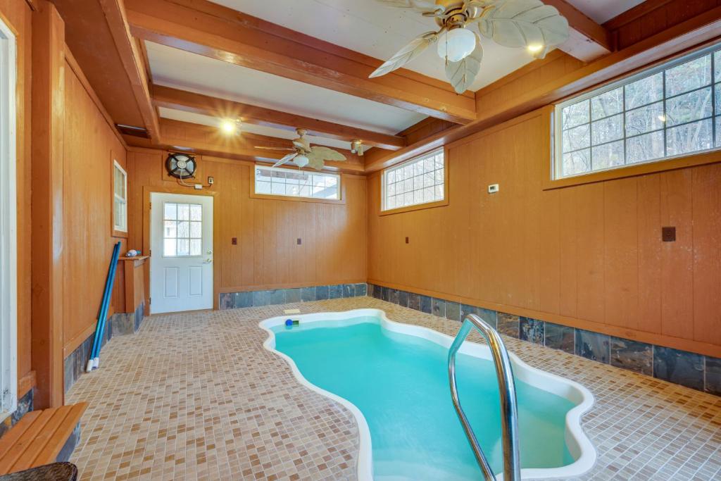 a jacuzzi tub in a room with a ceiling at Spacious Mooresville Home with Lake Norman View! in Mooresville