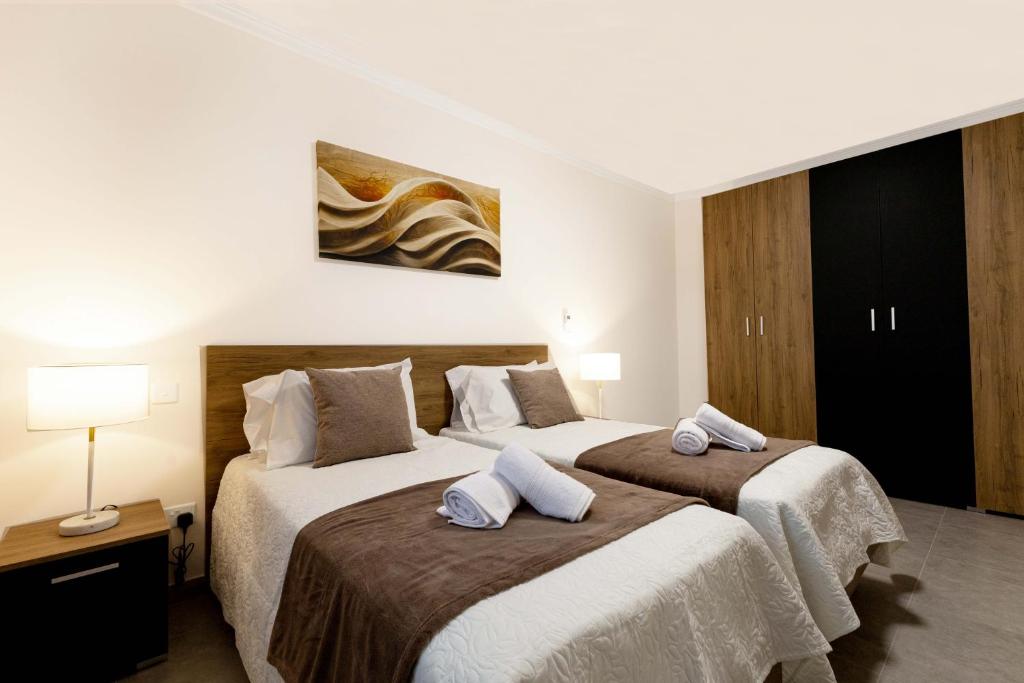 Postel nebo postele na pokoji v ubytování Luxurious & Spacious 1BD Stay at The Podium - Yacht Marina Area