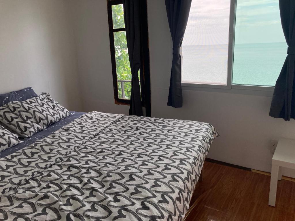 Postel nebo postele na pokoji v ubytování Baan na home stay