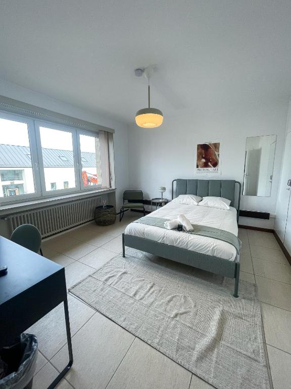 Postel nebo postele na pokoji v ubytování Arlon - Guest House