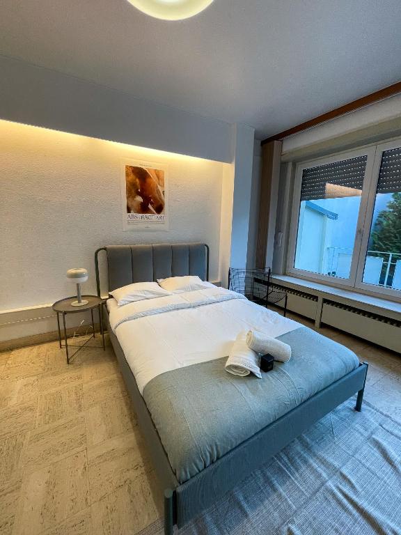Postel nebo postele na pokoji v ubytování Arlon - Guest House