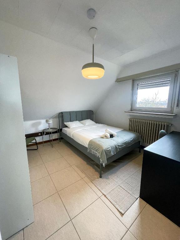Postel nebo postele na pokoji v ubytování Arlon - Guest House