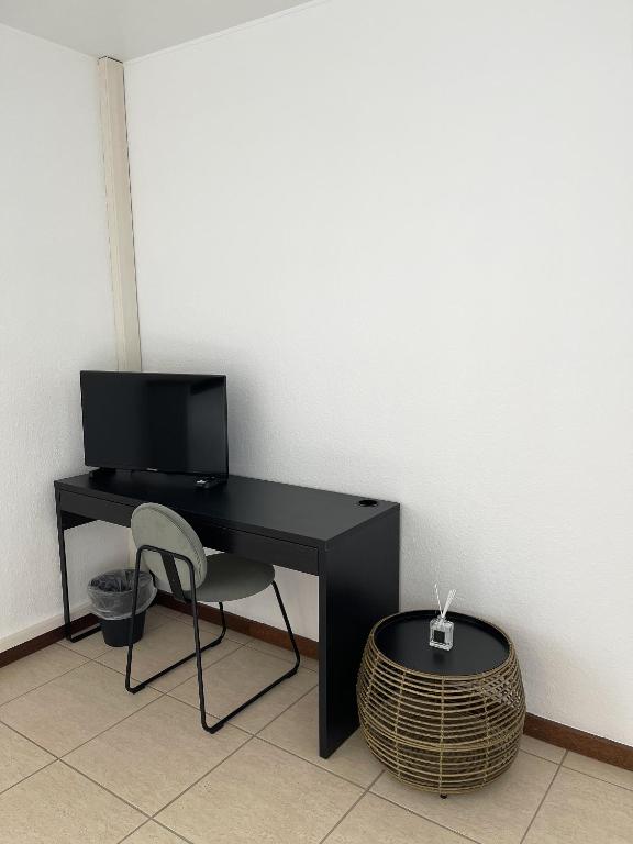 TV a/nebo společenská místnost v ubytování Arlon - Guest House