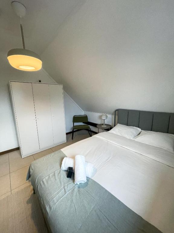 Postel nebo postele na pokoji v ubytování Arlon - Guest House