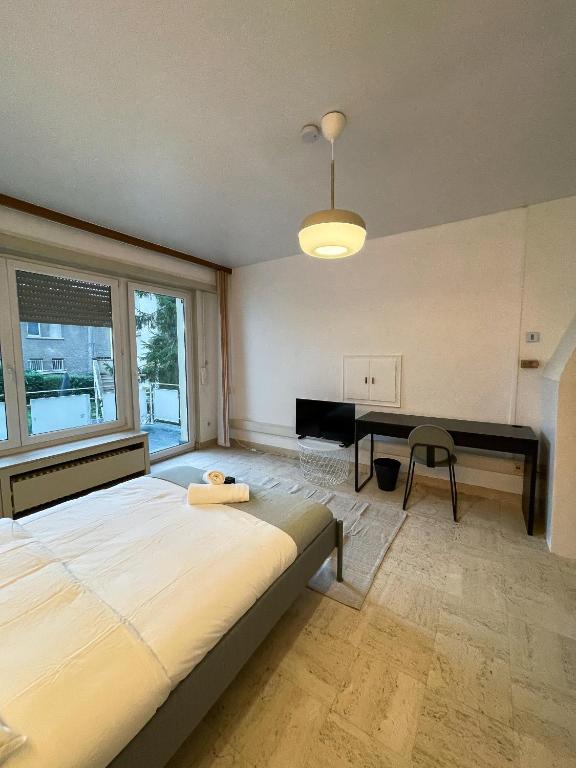 Postel nebo postele na pokoji v ubytování Arlon - Guest House