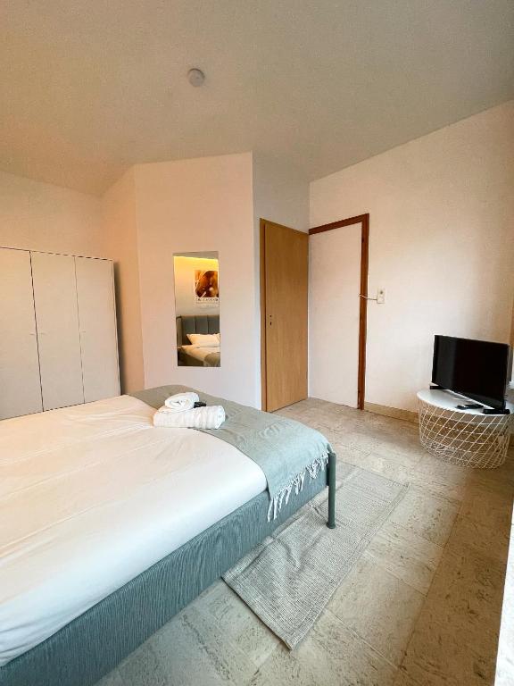 Postel nebo postele na pokoji v ubytování Arlon - Guest House