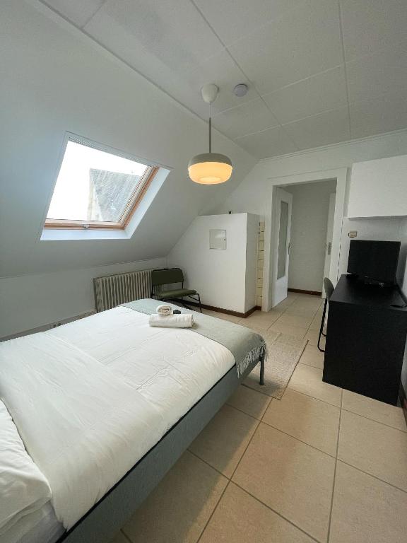 Postel nebo postele na pokoji v ubytování Arlon - Guest House