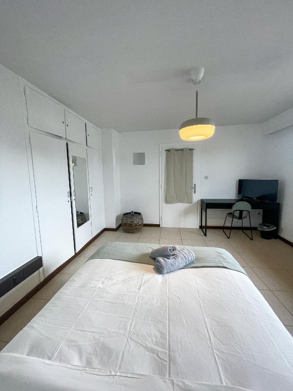 Postel nebo postele na pokoji v ubytování Arlon - Guest House