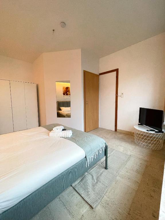 Postel nebo postele na pokoji v ubytování Arlon - Guest House
