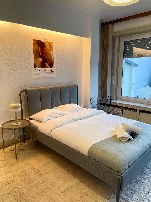 Postel nebo postele na pokoji v ubytování Arlon - Guest House