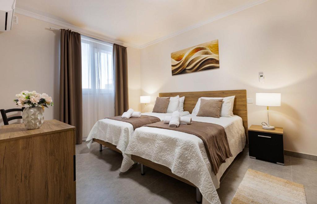 Postel nebo postele na pokoji v ubytování Luxurious & Spacious 1BD Stay at The Podium - Yacht Marina Area