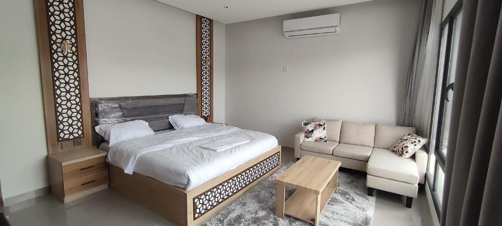 Postel nebo postele na pokoji v ubytování استراحة دهجان Dehjan chalet