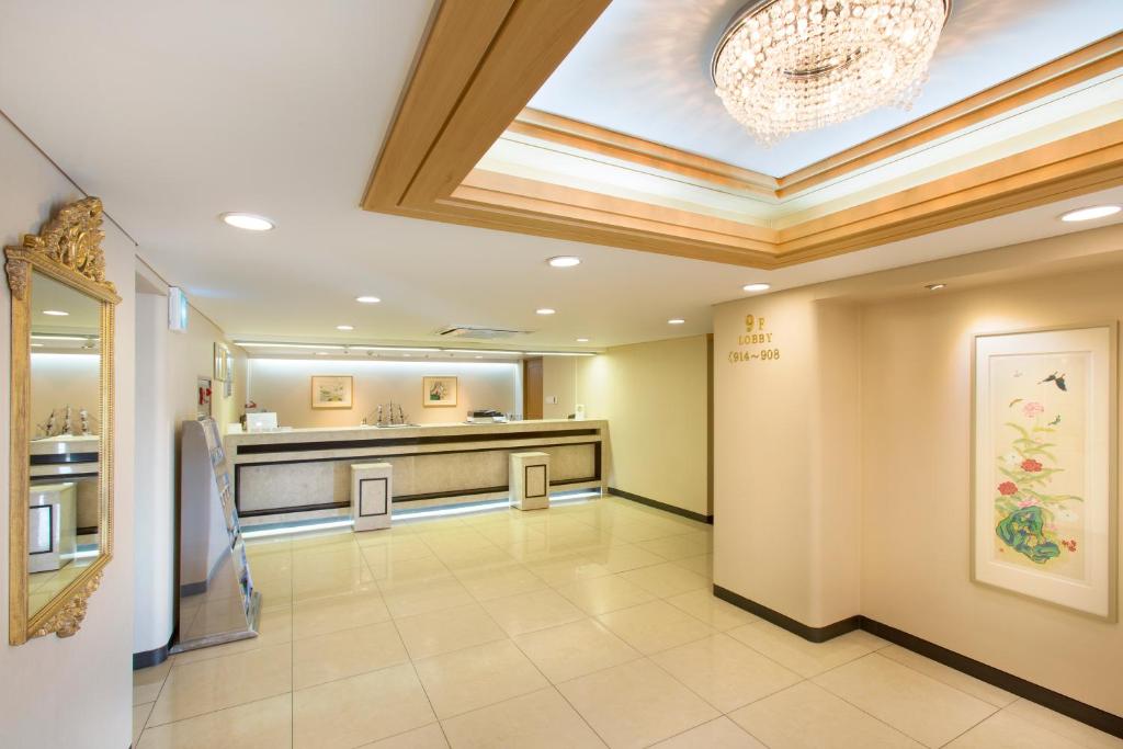 Kuchyň nebo kuchyňský kout v ubytování Libero Hotel