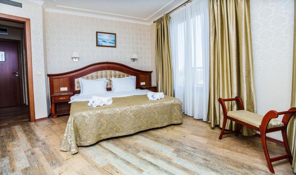 Postel nebo postele na pokoji v ubytování Aqua View SPA Boutique Hotel