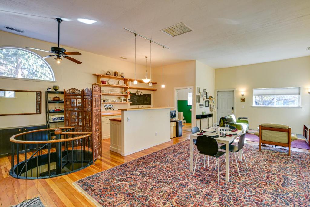 a kitchen and living room with a table and chairs at 1 Mi to City Plaza Family-Friendly Chico Home in Chico