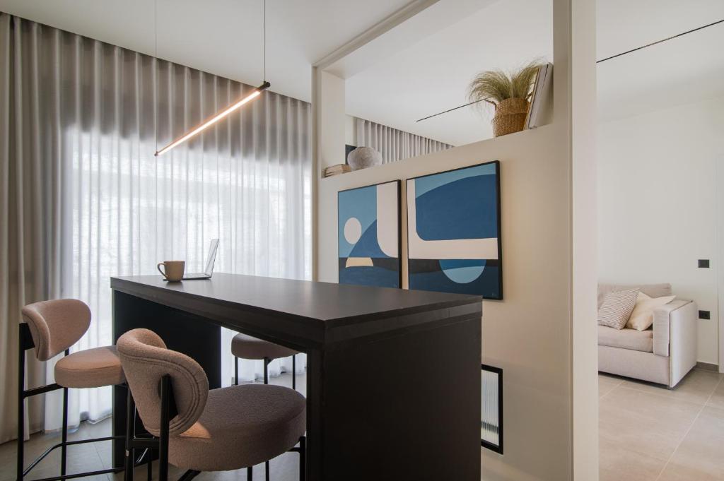 TV a/nebo společenská místnost v ubytování Kleopatra Homes