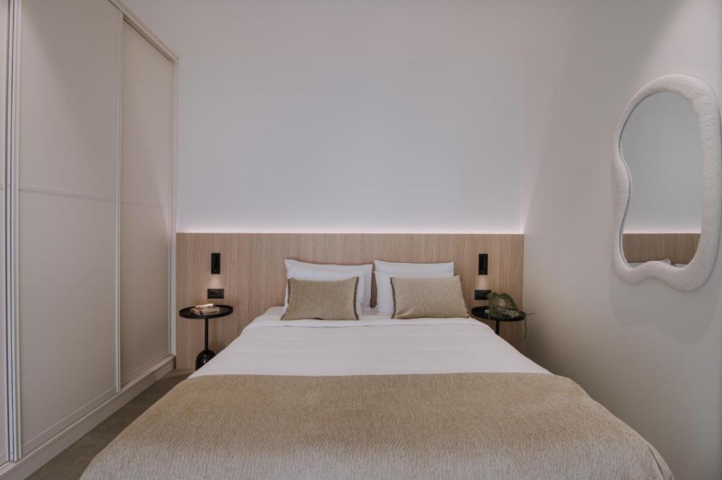 Postel nebo postele na pokoji v ubytování Kleopatra Homes