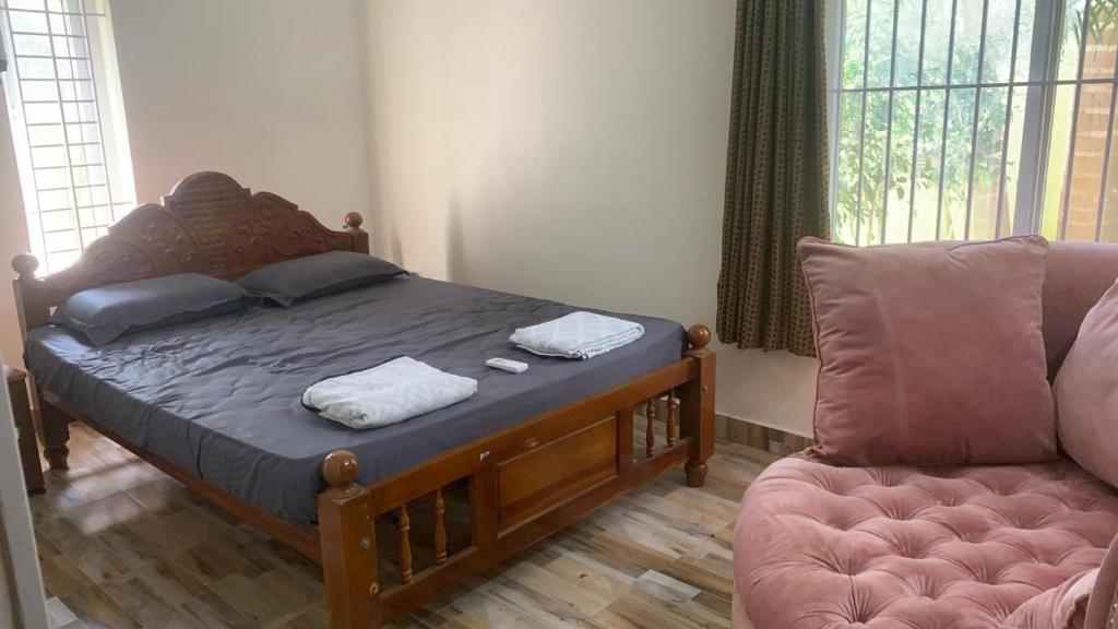 Ένα ή περισσότερα κρεβάτια σε δωμάτιο στο Alisha Grand Pool Villa by Royal Experiences