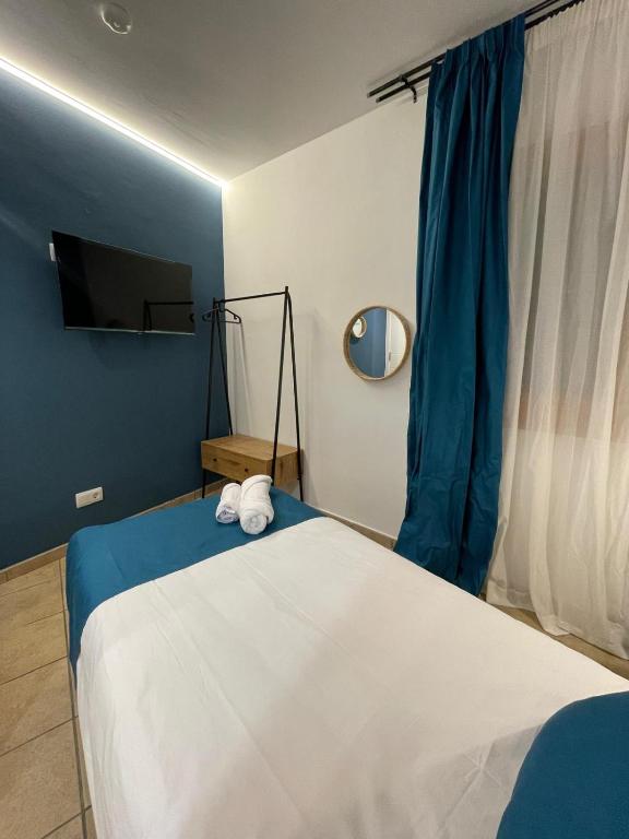 Postel nebo postele na pokoji v ubytování HOTEL ORENETA - Gironella