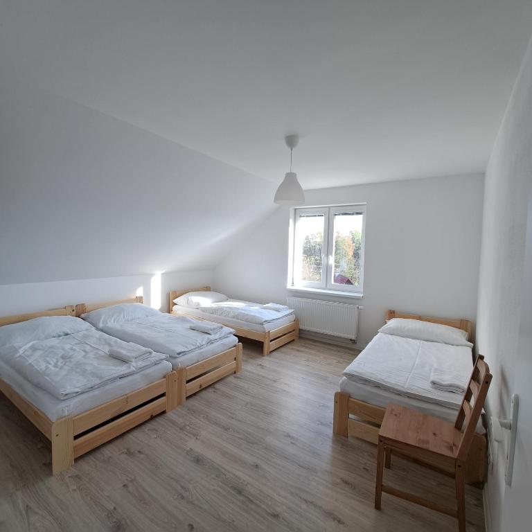 Postel nebo postele na pokoji v ubytování Apartmán Stará Myjava