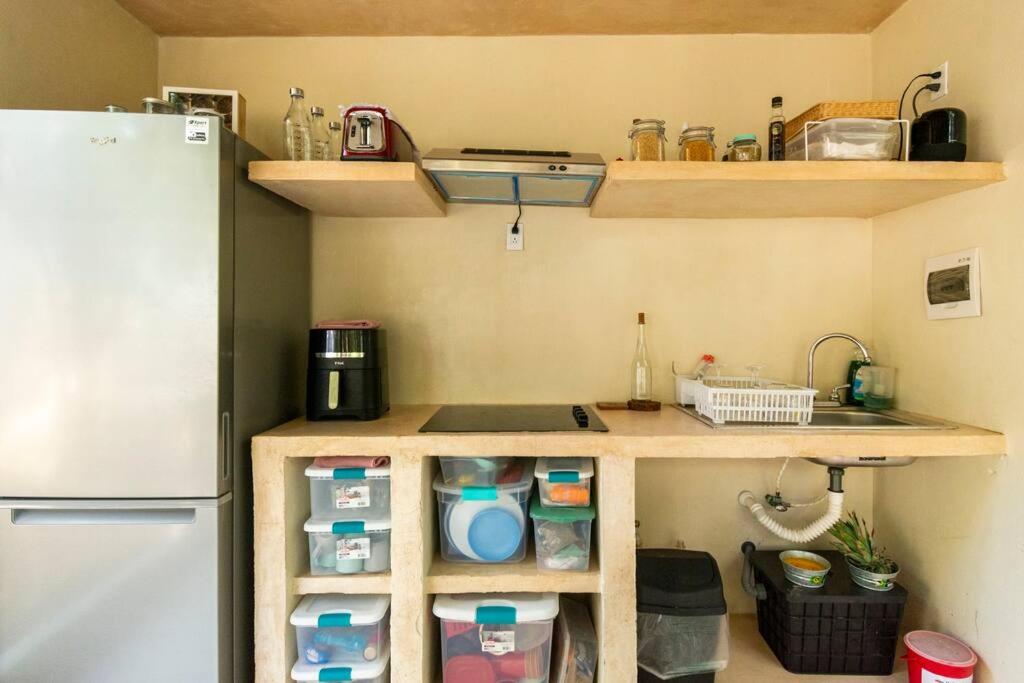 Kuchyň nebo kuchyňský kout v ubytování Glamping Mayan Glam
