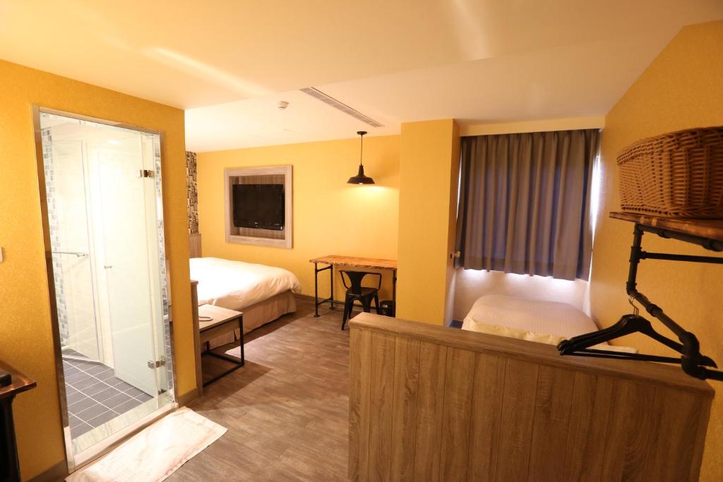 Postel nebo postele na pokoji v ubytování Central Hotel