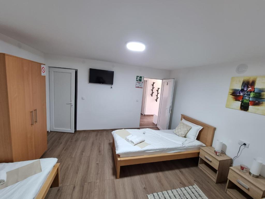 Krevet ili kreveti u jedinici u objektu Apartmani - Kladovski Konak