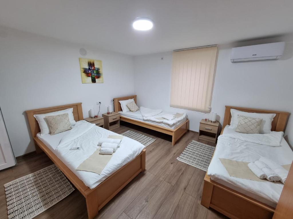 Krevet ili kreveti u jedinici u objektu Apartmani - Kladovski Konak